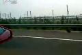 京津高速車友駕駛法拉利599趕超和諧號